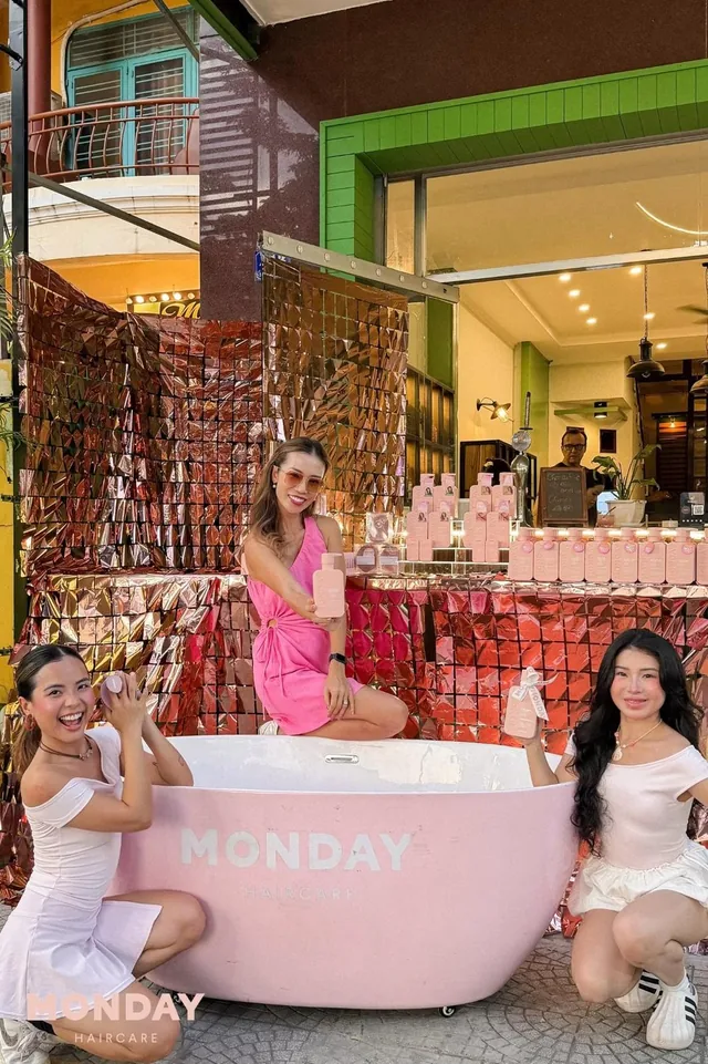 MONDAY Haircare team selfie at the pop-up
